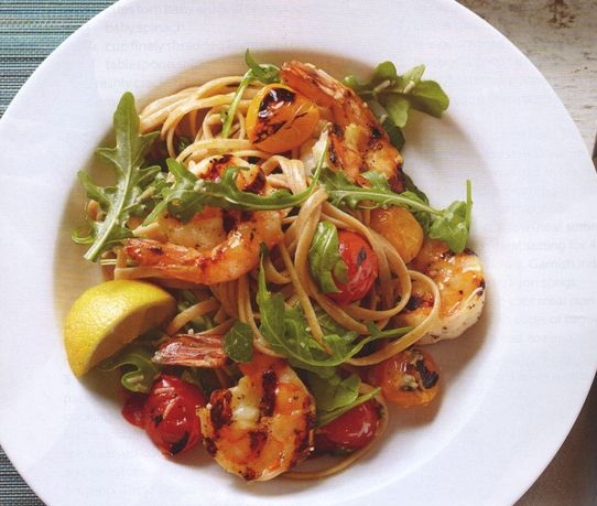 Pasta salad with grilled shrimps and tomatoes