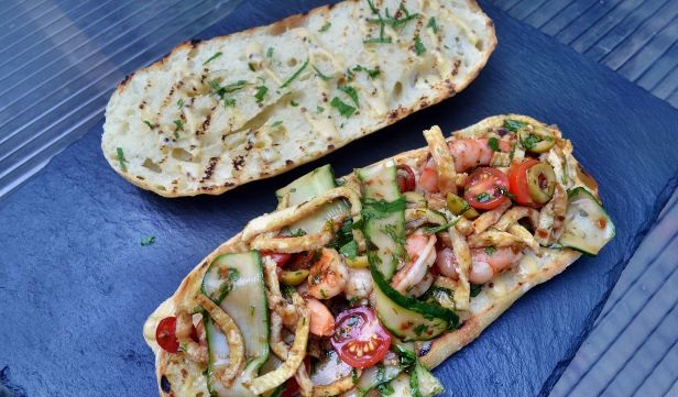 Baguette sandwich with shrimps and vegetables