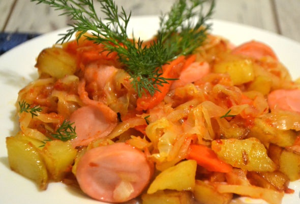 Stewed cabbage with sausages and potatoes