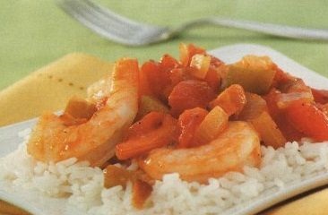 Vegetables with shrimps, stewed in tomato sauce