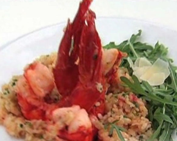 Risotto with shrimps and salad