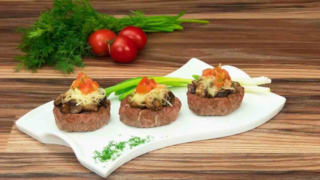 Meat baskets with mushrooms under cheese