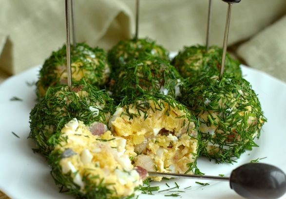 Snack balls with herring, potatoes, cream cheese and eggs