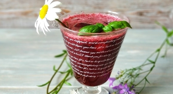 Summer drink with blackcurrant and basil