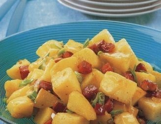 Potatoes with smoked sausages, green onions, chili and cheese
