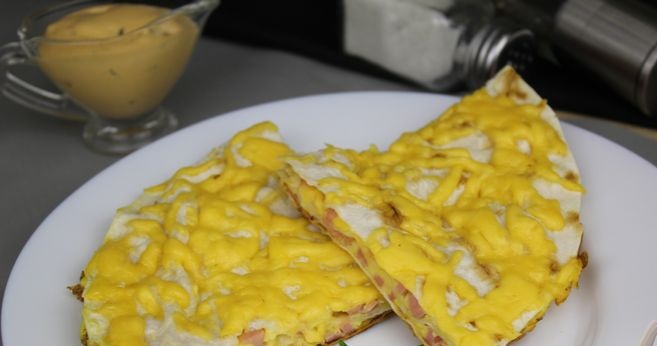 Omelet in pita bread with sausage and cheese