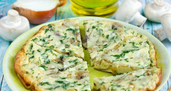 Omelet with mushrooms, onions and cheese