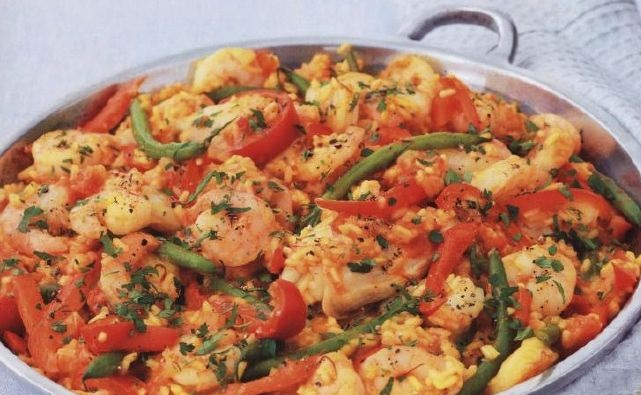 Paella with chicken and shrimps