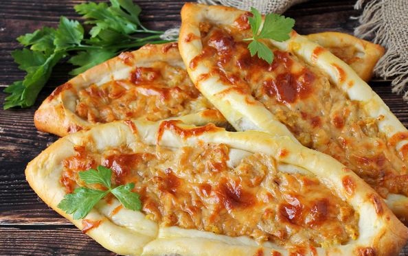 Pide with potatoes, cheese and garlic
