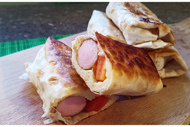 Sausages In Pita Bread With Cheese And Bell Pepper