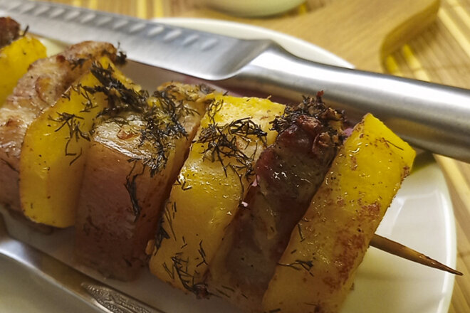 Potatoes With Brisket On Skewers In The Oven