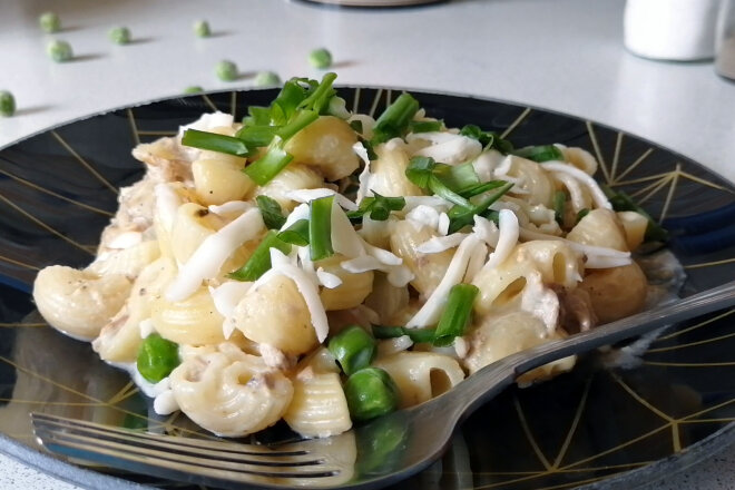 Pasta With Tuna And Green Peas In A Creamy Cheese Sauce