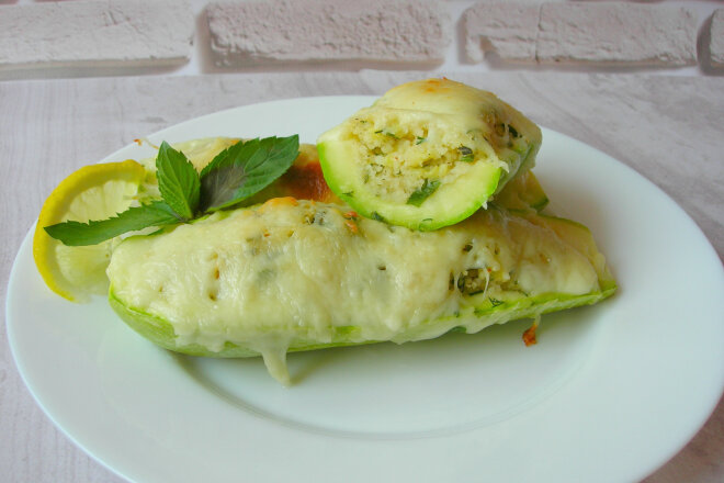 Zucchini Stuffed With Couscous And Cheese In The Oven