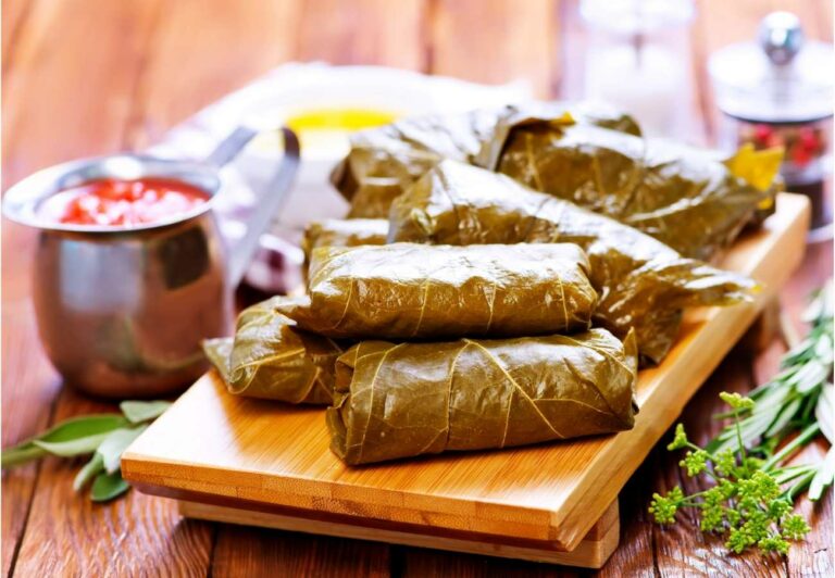 Are there any specific cooking techniques used in Antiguan and Barbudan cuisine?
