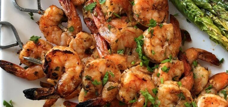 Prawns on the Barbie: Skewer marinated prawns and grill them on the barbecue until cooked and slightly charred.
