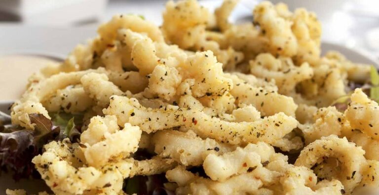 Salt and Pepper Squid: Coat tender squid rings in a seasoned flour mixture and deep-fry until crispy and golden.