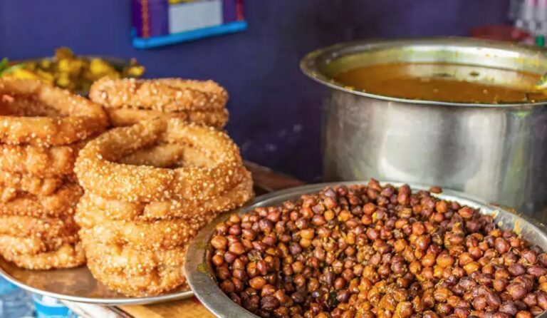 How has the geography and diverse ethnic groups in Nepal influenced its cuisine?