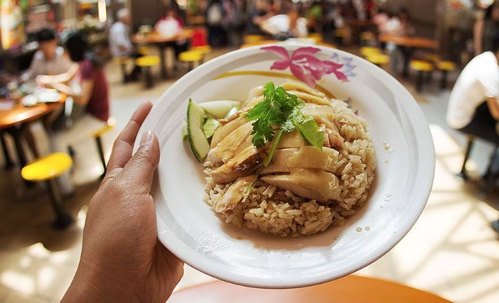 Are there any unique cooking techniques or methods used in Singaporean cuisine?