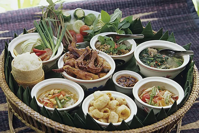 What are the staple ingredients used in Thai cooking?