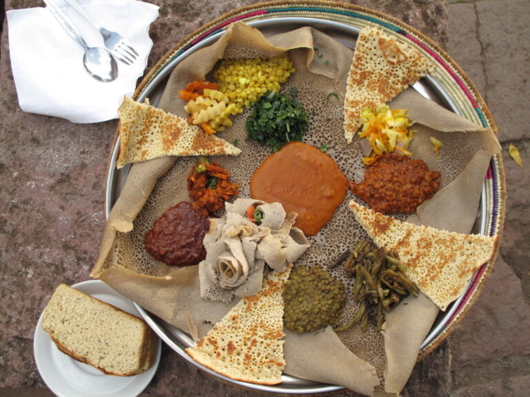 Can you explain the process of making “tsebhi,” a traditional Eritrean meat stew?