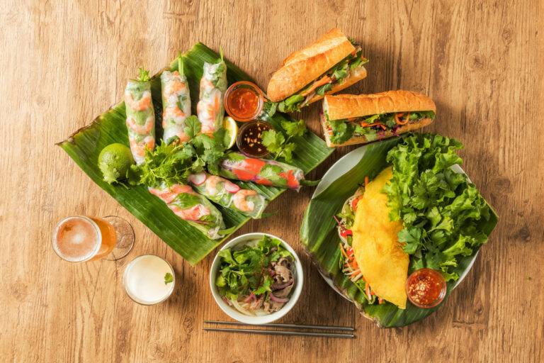 How does Vietnamese street food differ from restaurant cuisine?