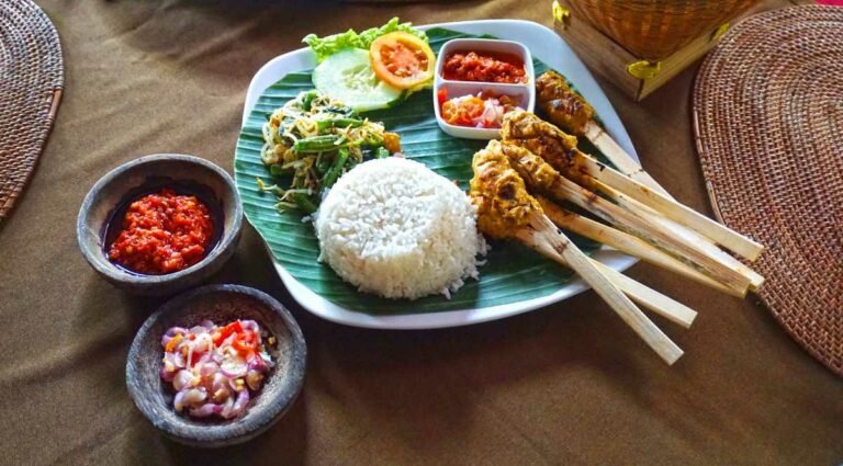 Can you recommend some must-try dishes for someone visiting Indonesia?