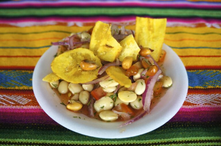 Can you explain the use of corn and potatoes in Ecuadorian dishes?