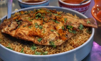 Are there any specific breads or pastries associated with Kuwaiti cuisine?