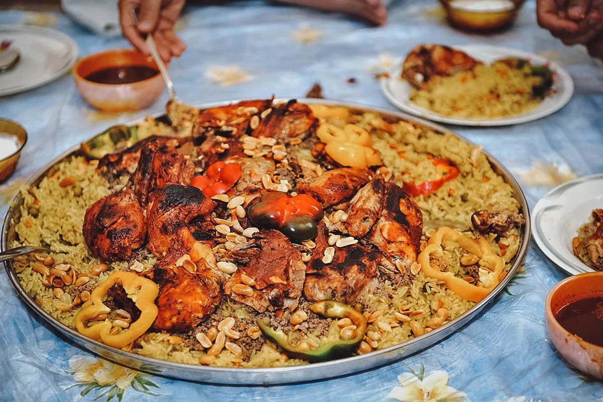 How does Emirati cuisine reflect the influence of Arab, Persian, and Indian flavors?