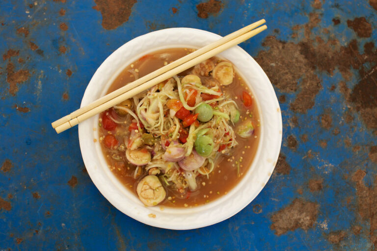 Are there any specific dietary restrictions or considerations in Laotian cuisine?