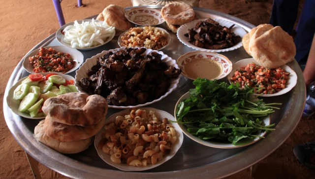 Can you recommend any traditional Sudanese restaurants or food experiences?