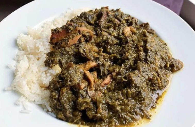 What is grilled bushmeat, and how is it prepared?