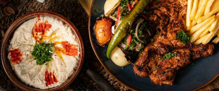 Are there any specific cooking techniques used in Bahraini cuisine?