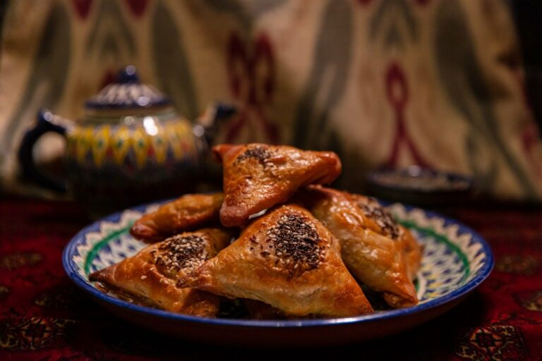 Are there any Tajik dishes that are considered breakfast foods?