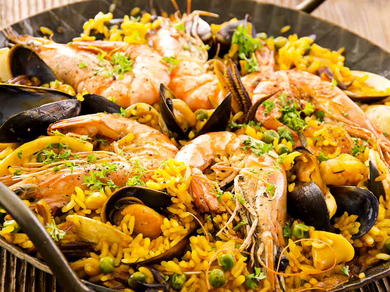 Can you tell me more about the use of seafood in Spanish dishes?
