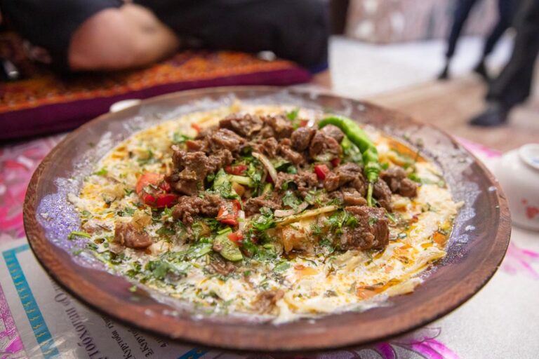 What is Tajik cuisine known for?
