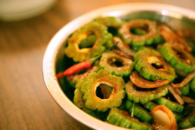 What are some traditional dishes in Suriname?
