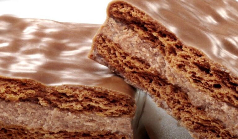 Tim Tam Slam: Enjoy Tim Tam biscuits by biting off opposite corners and using them as a straw to drink coffee or hot chocolate.