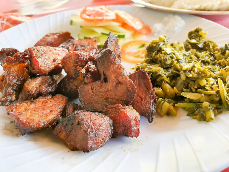Are there any Tanzanian dishes influenced by Swahili or Zanzibari cuisines?