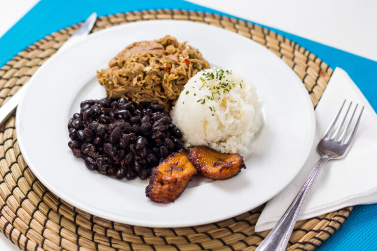 What is the influence of Spanish cuisine on Venezuelan dishes?