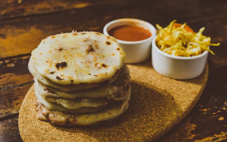 Are there any signature dishes in El Salvadoran cuisine?