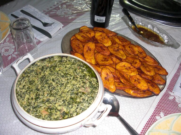 Can you tell me about the role of yam, plantains, and cassava in Cameroonian cuisine?