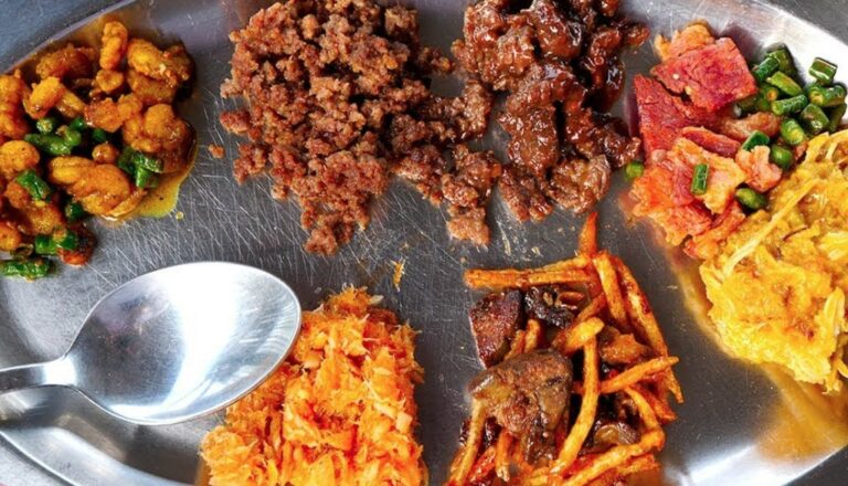 What are the main influences on Surinamese cuisine?