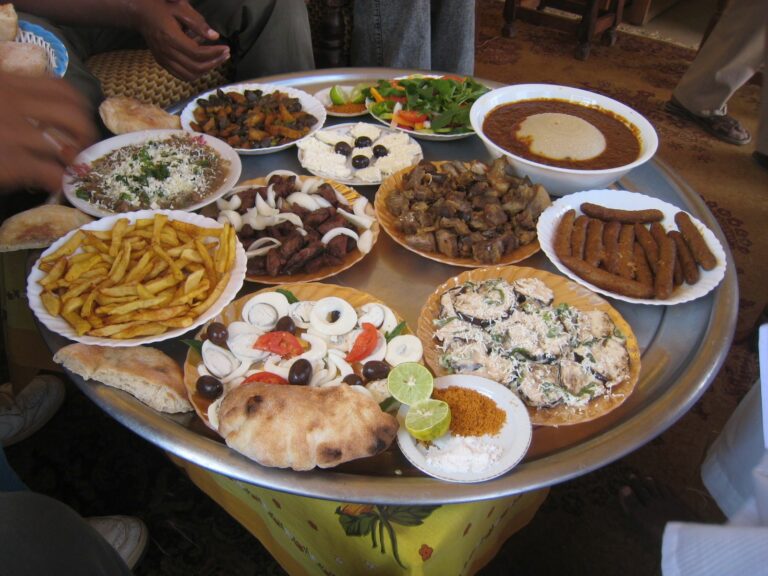 Are there any local food customs or dining etiquettes to be aware of in Sudan?