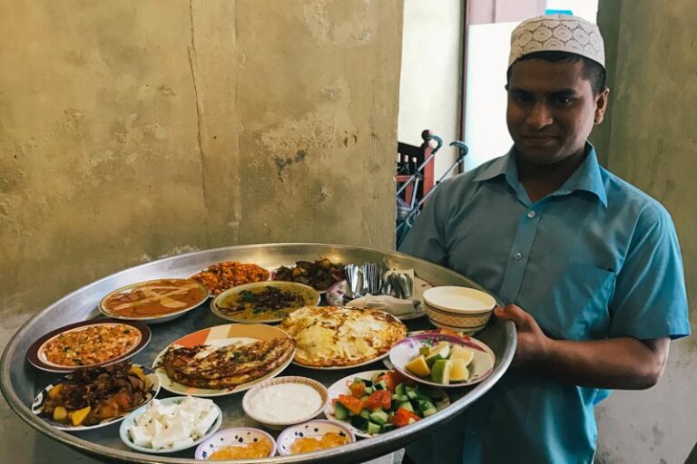 Can you recommend some typical Bahraini dishes for a first-time visitor?