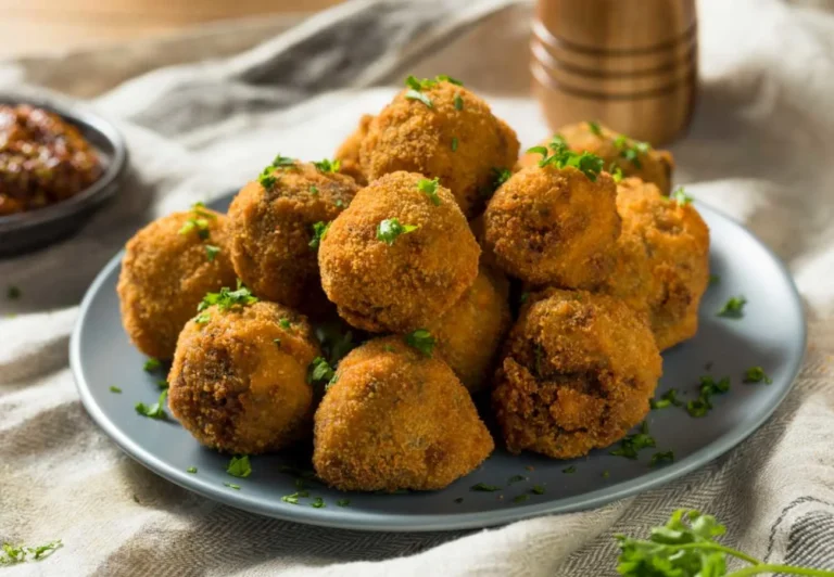 What are some common spices and herbs used in Dutch cooking?