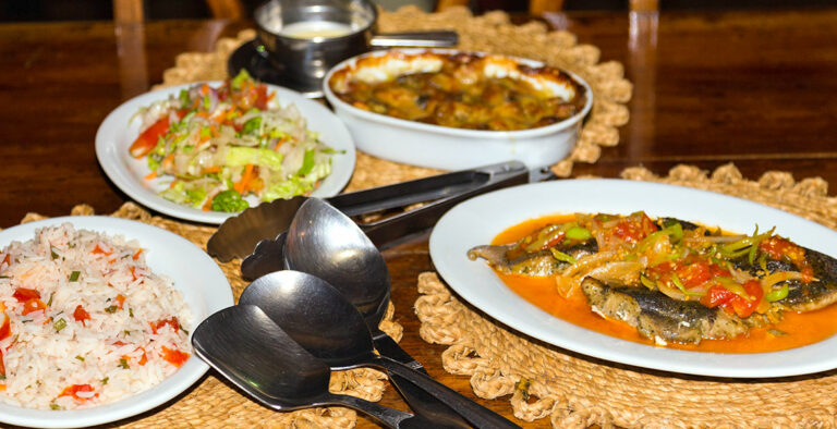 Are there any Trinidadian dishes that are considered breakfast foods?