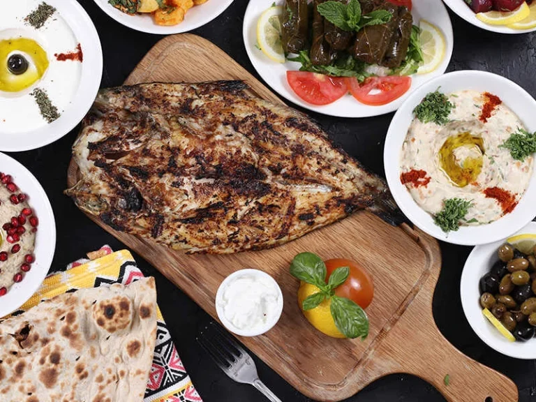 Can you find any influences from neighboring countries in Iraqi cuisine?