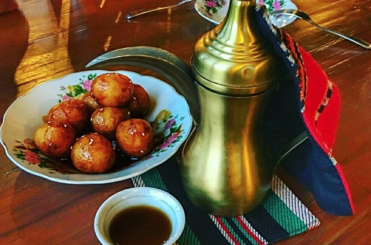 What is the significance of dates in Emirati cuisine?