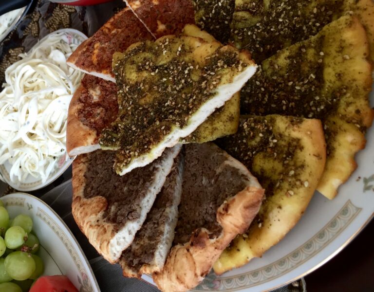 What is Syrian cuisine known for?